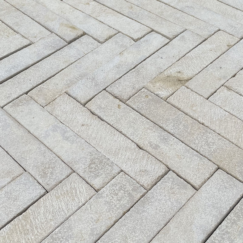 Paved outdoor area with natural stone flooring